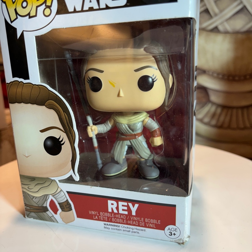 Funko Pop Rey Star Wars Vinyl Figure with Gray and Brown Outfit